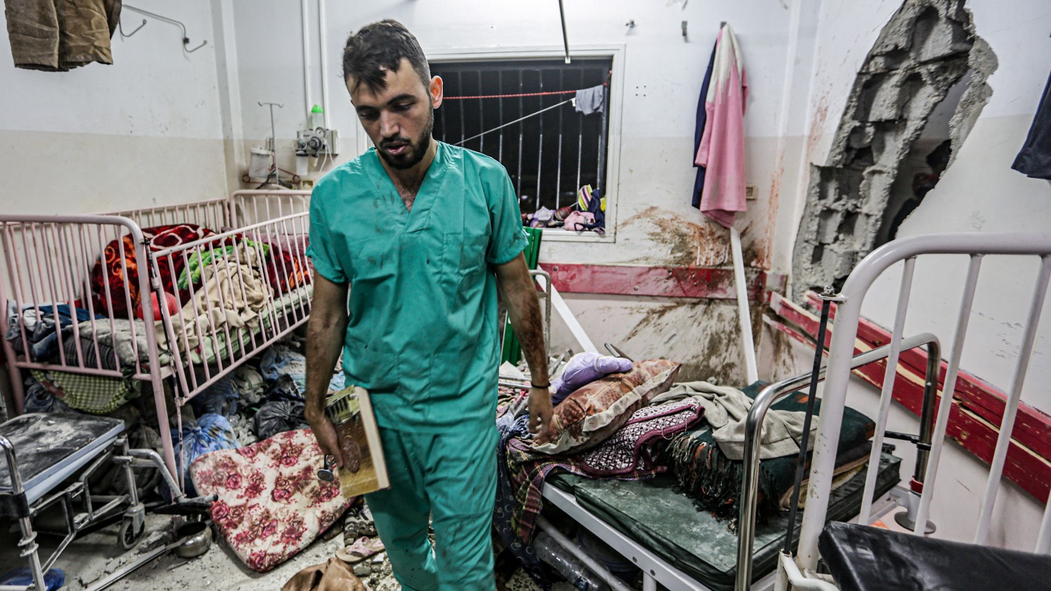 war-on-gaza:-palestinian-doctor-asks-biden-how-‘many-more-need-to-die’-before-us-demands-ceasefire