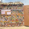 building-made-of-cans-stands-to-carry-message-to-the-world