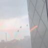 high-winds-leave-crew-dangling-from-beijing-skyscraper